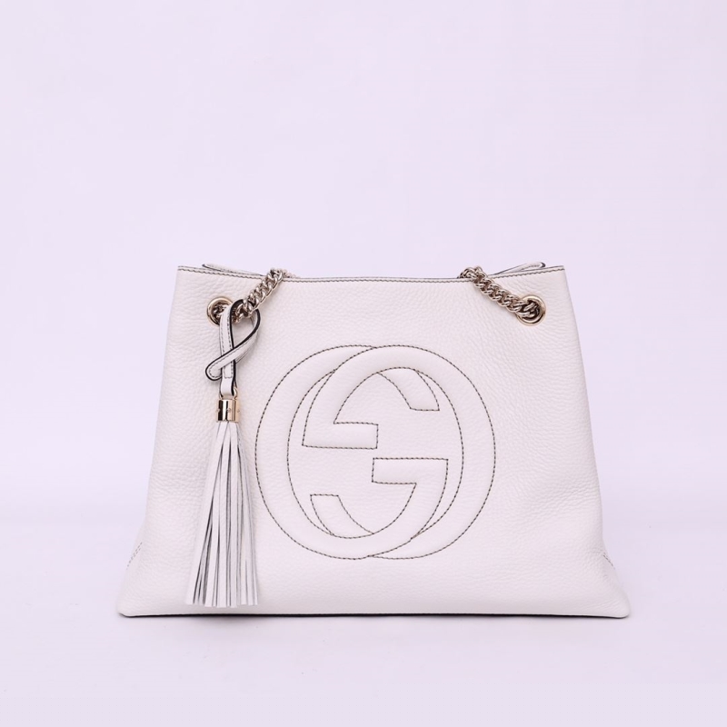 G*u*i shopping bags
